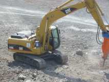 Cat 320C with Hammer